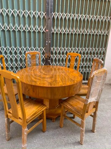 Bộ bàn ghế ăn tròn đóng hộp giả nguyên khối gỗ hương xám (Chú Cương, Hải Phòng)